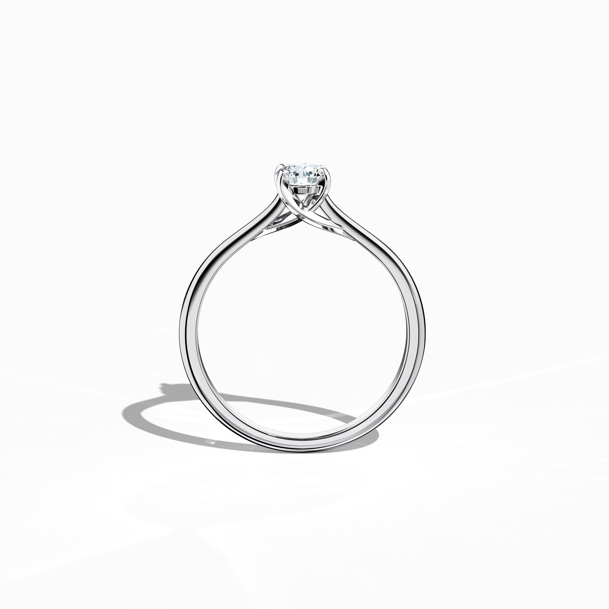 Refined solitaire diamond ring with a 0.30  карат center stone in a unique twisted bottom design, supported by four‑tap prongs in белое золото and a bright белое золото band. Photographed from a standing front view, this fine Украшения/fine Ювелирные изделия ring exhibits modern elegance and a crisp, luminous profile.