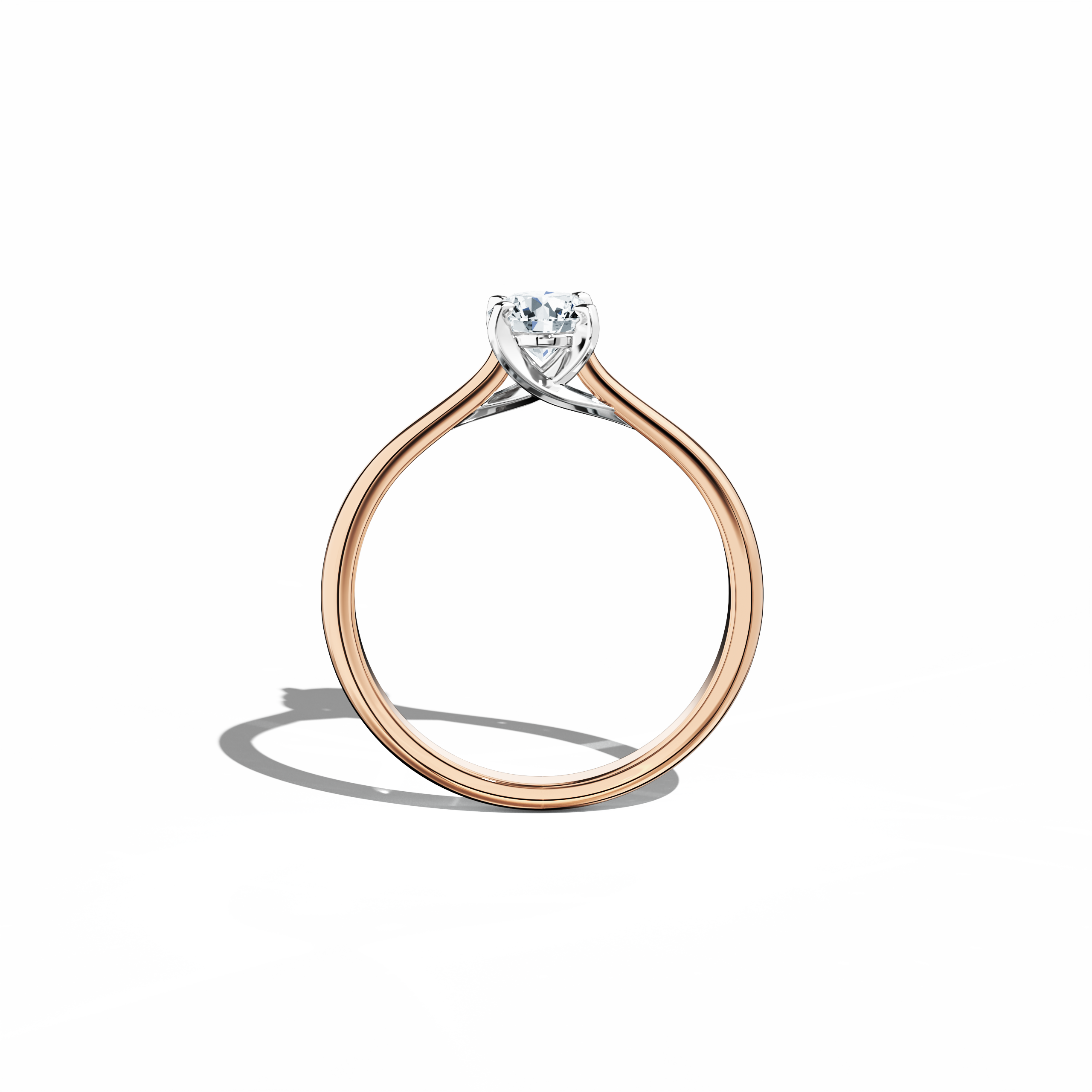 Refined solitaire diamond ring with a 0.50  карат center stone in a unique twisted bottom setting, secured by four‑tap prongs in белое золото and paired with a soft розовое золото band (blush/pink gold). Shown from a standing front view, this fine Украшения/fine Ювелирные изделия ring exemplifies modern romance and sophisticated design with a warm, radiant glow.