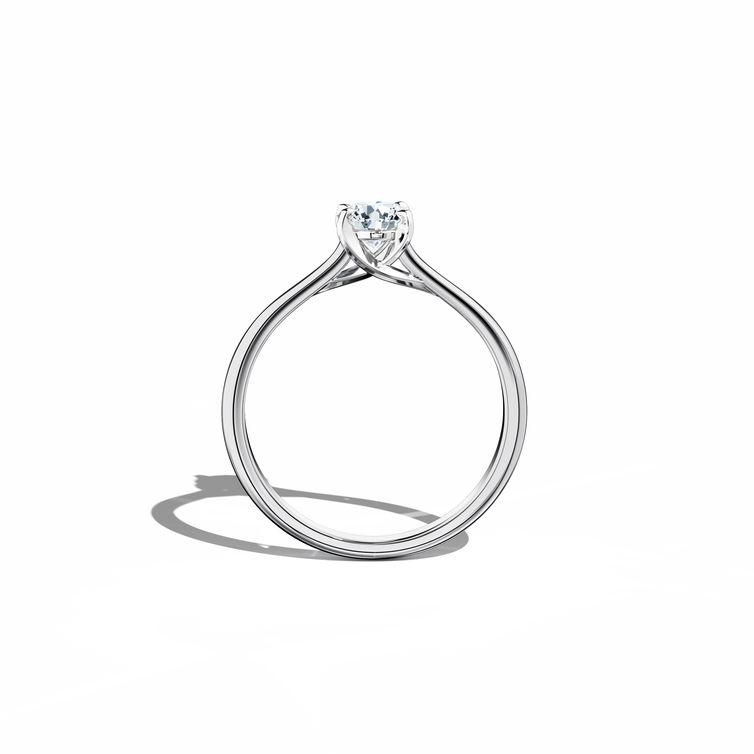 Refined solitaire diamond ring with a 0.50  карат center stone in a unique twisted bottom setting, secured by four‑tap prongs in белое золото and complemented by a bright белое золото band. Photographed from a standing front view, this fine Украшения/fine Ювелирные изделия ring exhibits a crisp, modern silhouette and radiant finish.