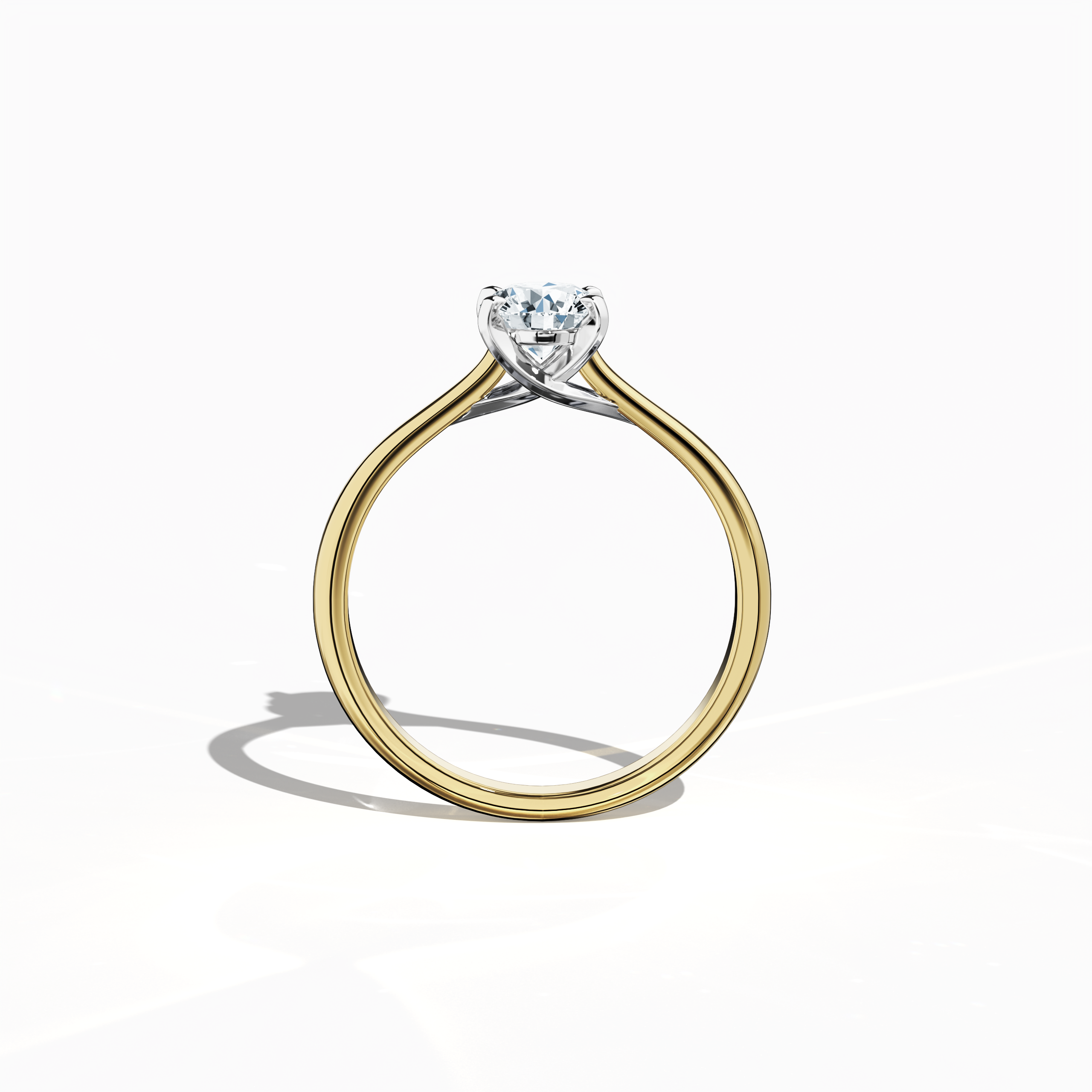 Refined solitaire diamond ring with a 0.70  карат center diamond in a unique twisted bottom design and four‑tap prongs in белое золото, paired with a rich жёлтое золото band (classic/warm жёлтое золото). Shown from a standing front view, this fine Украшения/fine Ювелирные изделия ring exhibits a balanced silhouette and a striking, warm glow.