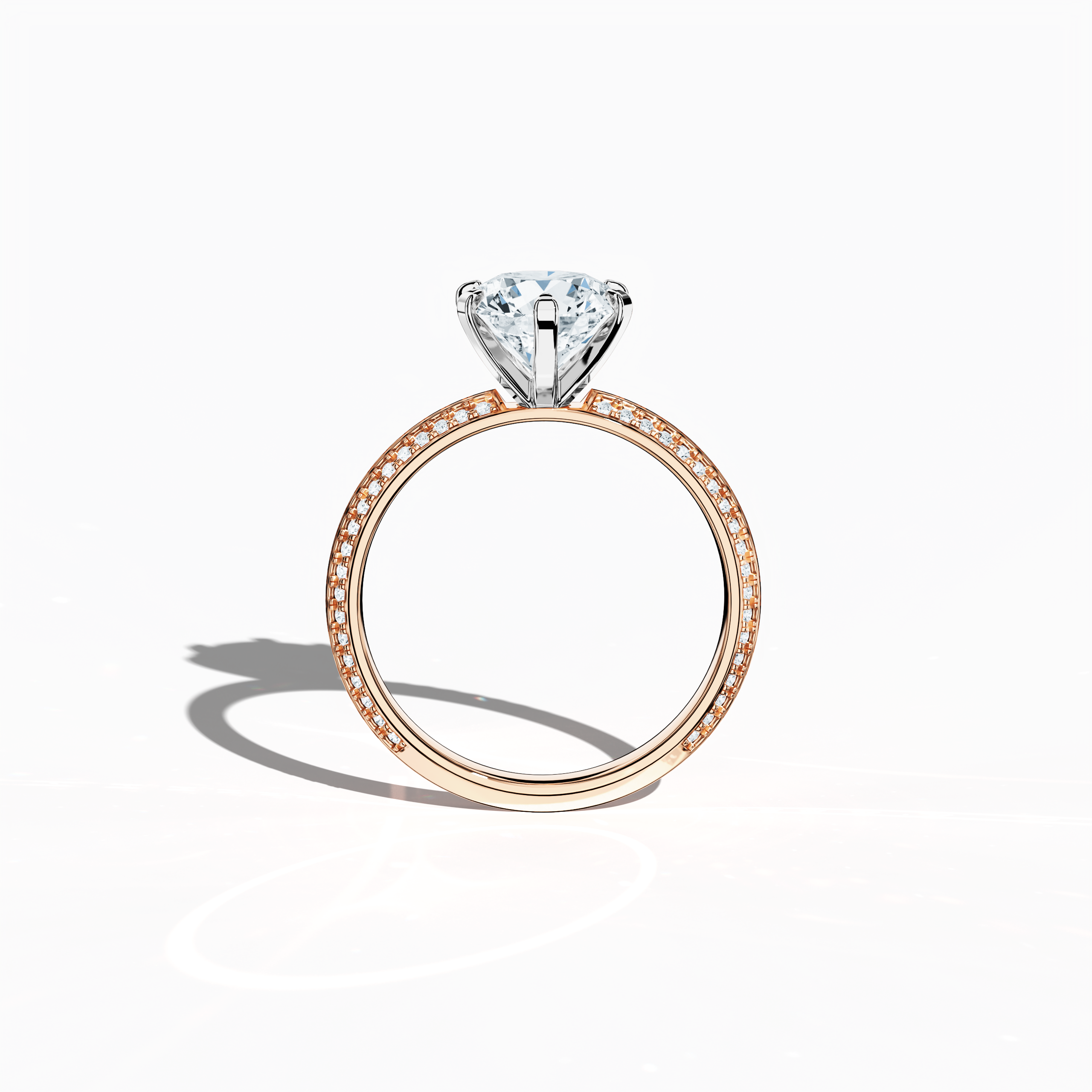 Classic solitaire diamond ring with 2.40 карат total carats—2 карат center diamond and 0.40 карат pavé side stones—set in soft розовое золото (blush/pink gold) with a distinctive two‑step band featuring a crisp central line. Displayed in a front view, this fine Украшения/fine Ювелирные изделия ring offers a perfect blend of brilliant sparkle and contemporary romance.