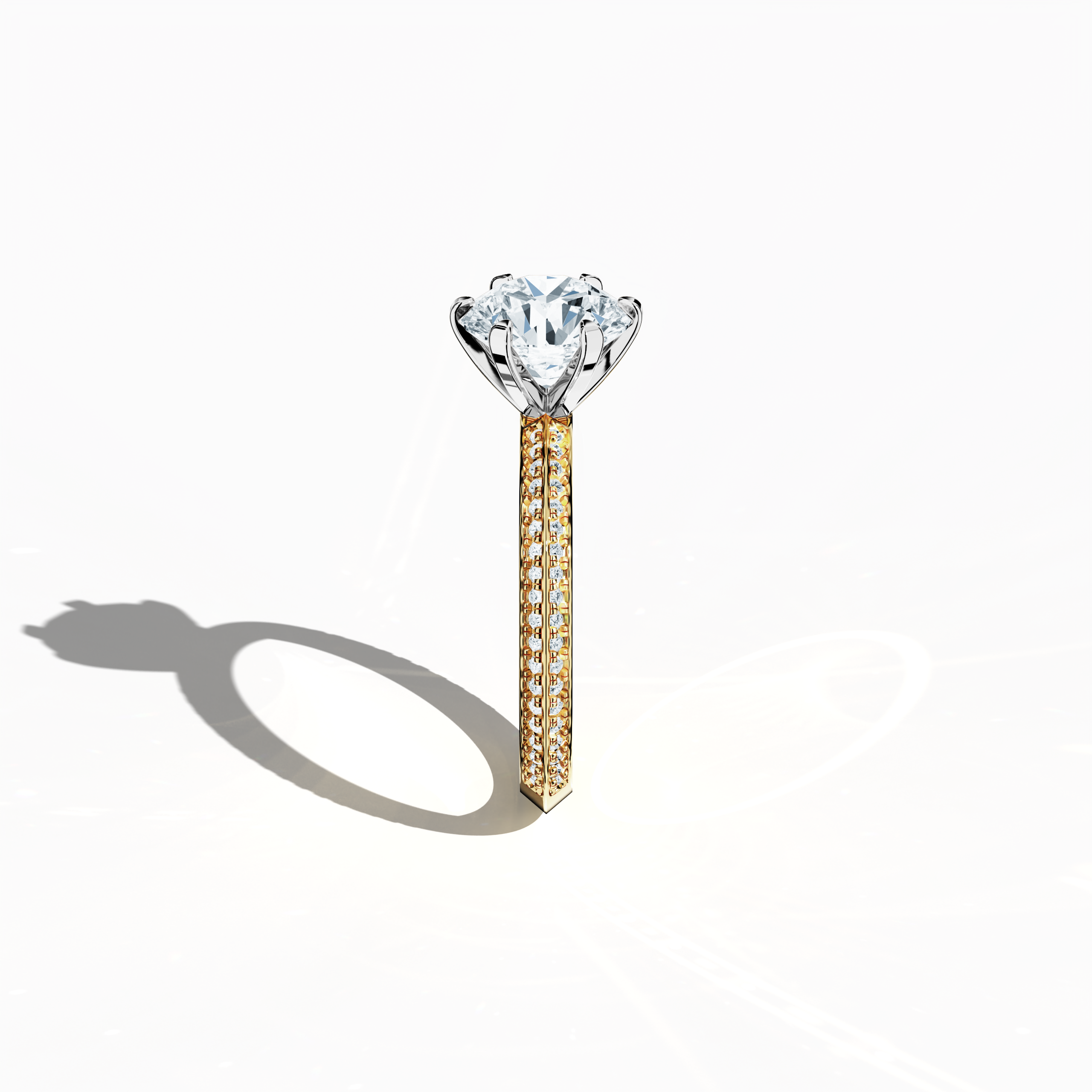 Refined solitaire paved ring with 2.40 карат total diamonds (2 карат center, 0.40 карат side stones) in a six‑prong baby claw setting and a two‑step band with a sharp central line, set in a rich жёлтое золото band. Photographed from a standing side view, this fine Украшения/fine Ювелирные изделия ring showcases its elegant contours and vibrant, warm finish.