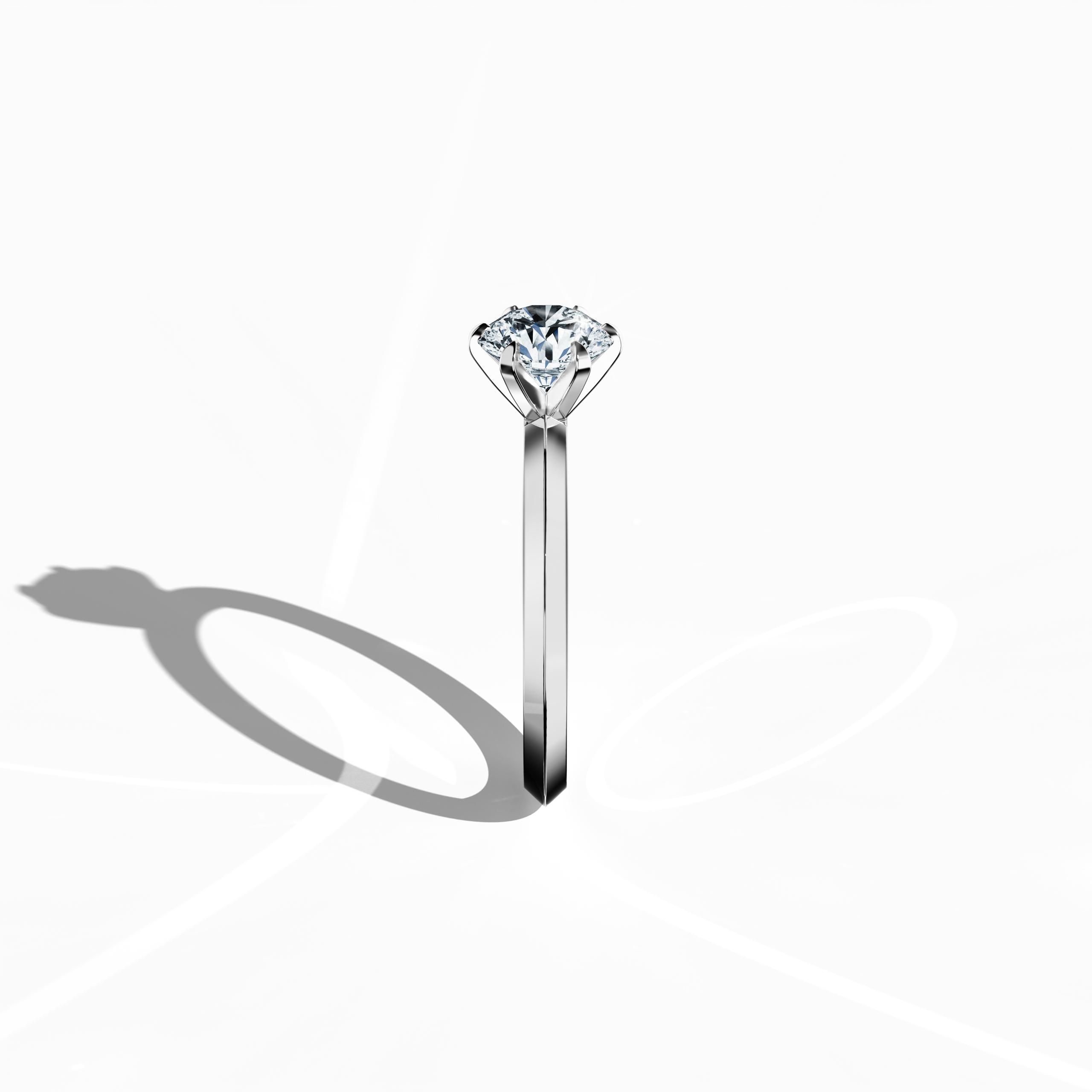 Elegant solitaire diamond ring with a 1 carat center diamond in a six-baby claw prong setting and a dual-level band with a sharp midline, set in a bright белое золото band. Captured from a standing side view, this refined fine Украшения/fine Ювелирные изделия piece showcases its graceful contours and prong detailing