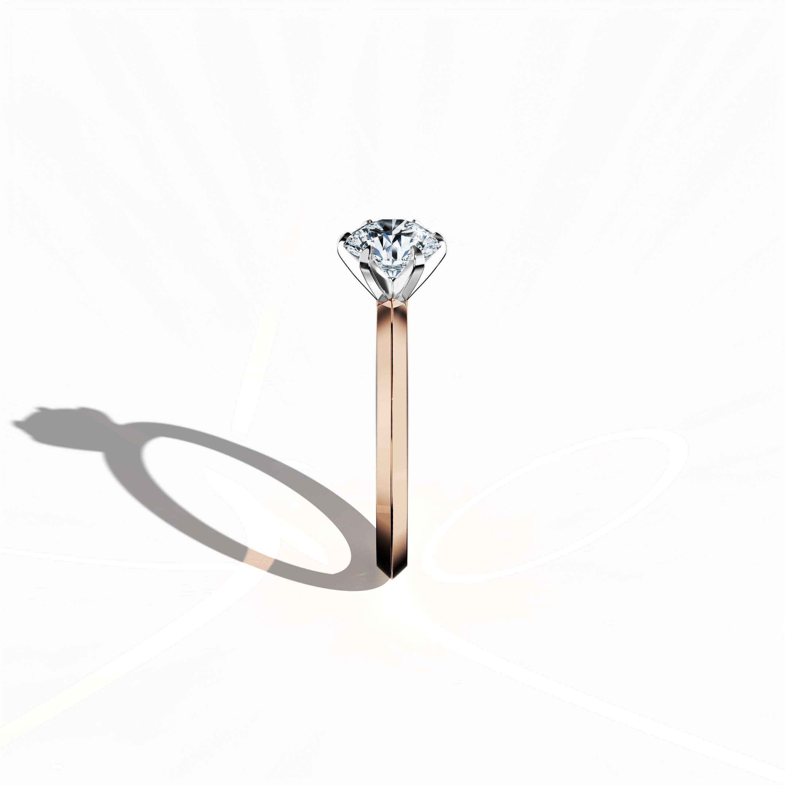 "Refined 2 carat diamond solitaire ring with a six-baby claw prong setting and a crisp two-step band, set in a soft розовое золото band (blush/pink gold). Photographed from a standing side view, this fine Украшения/fine Ювелирные изделия accessory showcases its elegant contours and warm, romantic allure.