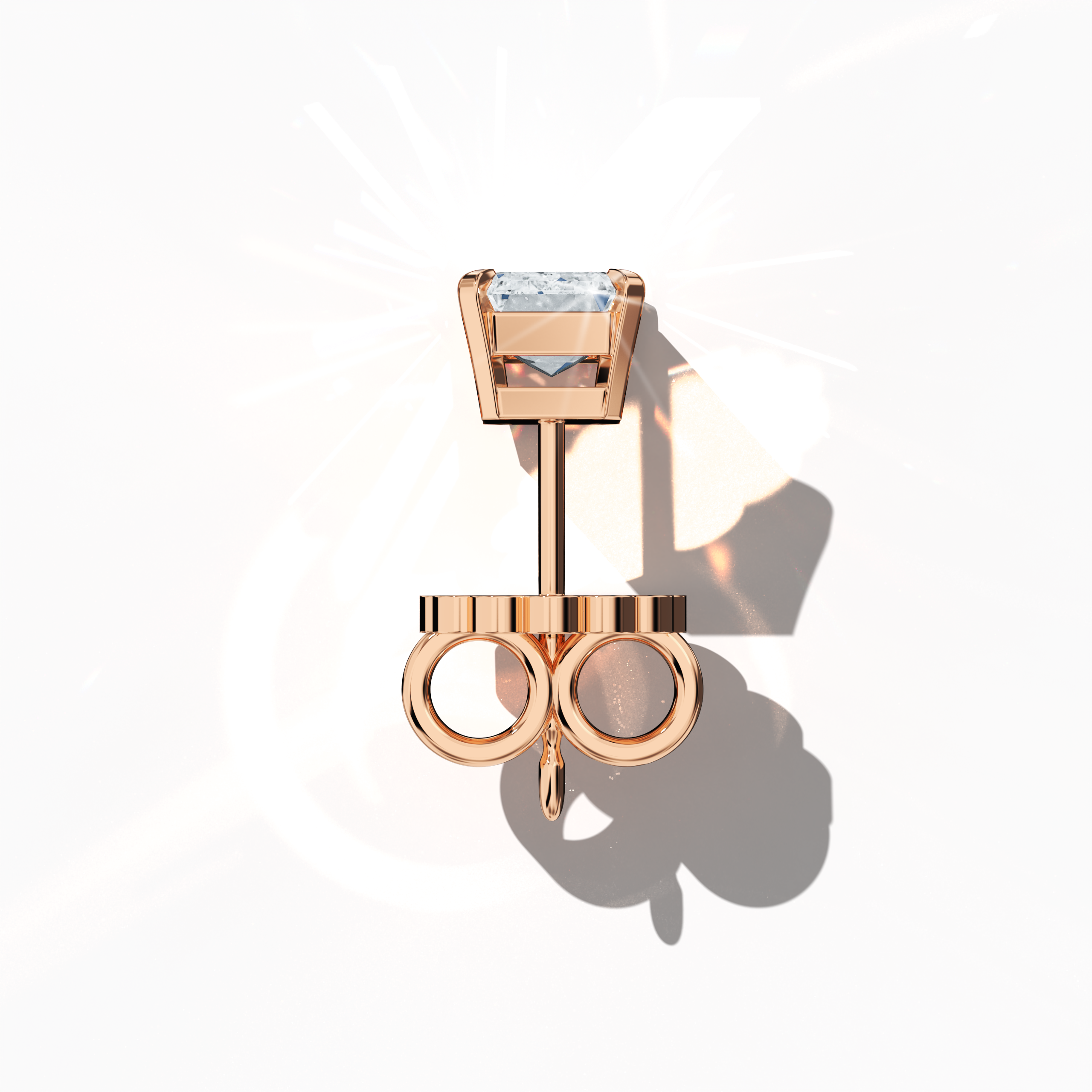 Top view of 1-carat natural emerald earring in 18k розовое золото with prong setting; emerald stud, 1ct natural emerald, luxury fine Украшения/fine Ювелирные изделия ear accessory.