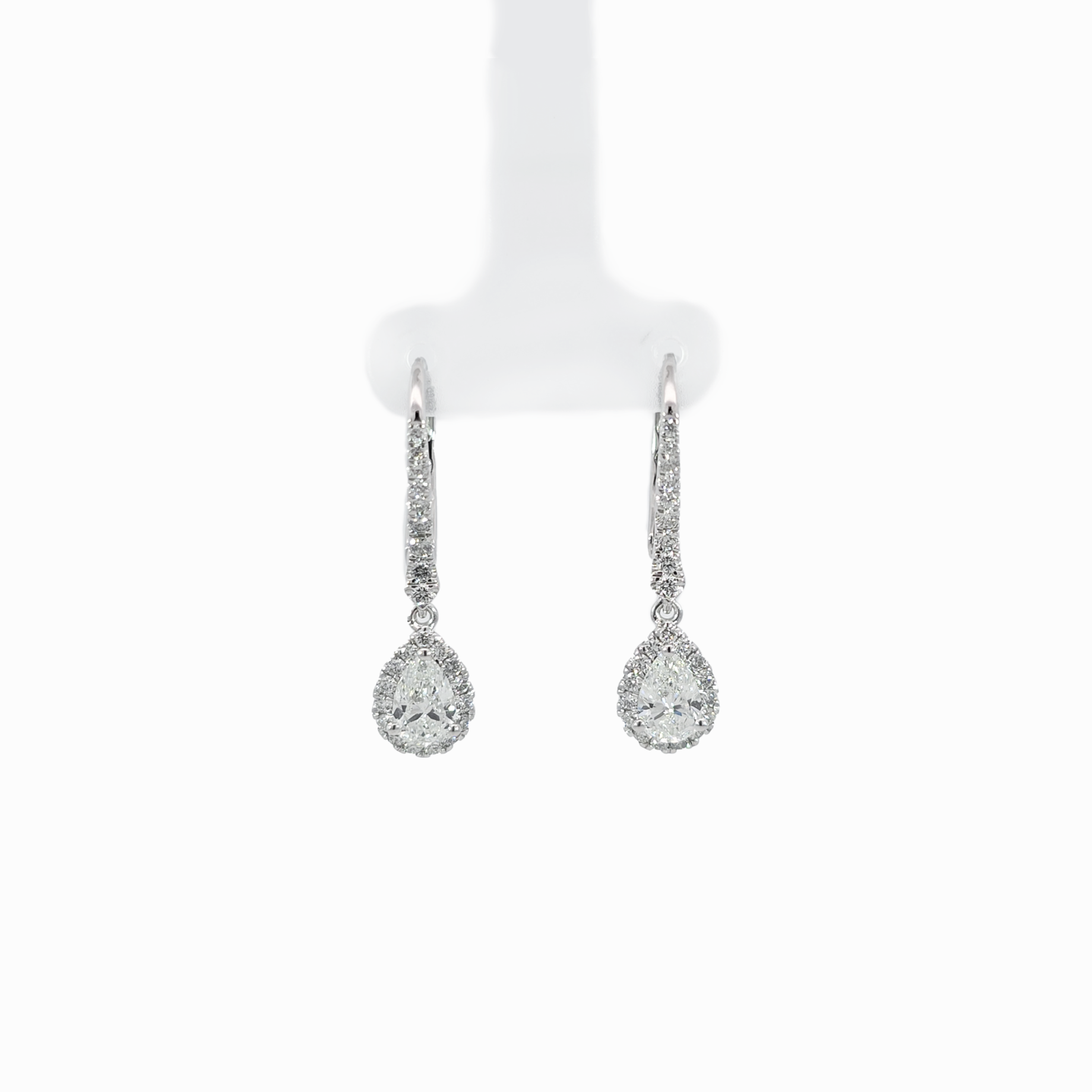 0.90 Carat Pear Halo Earring GIA certified H color VVS clarity 18K white gold handcrafted in Dubai
