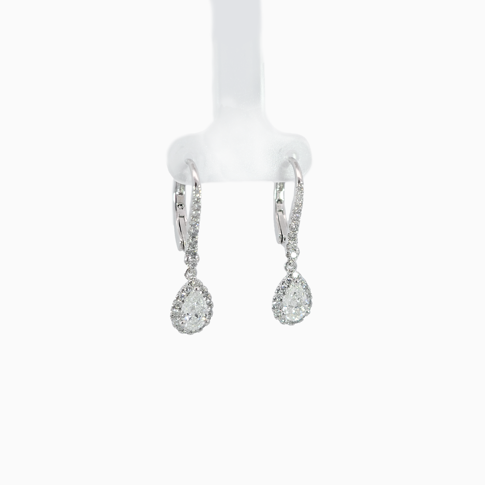 Pear Halo Earring side view showing 0.30 carat center diamonds with halo setting in 18K white gold