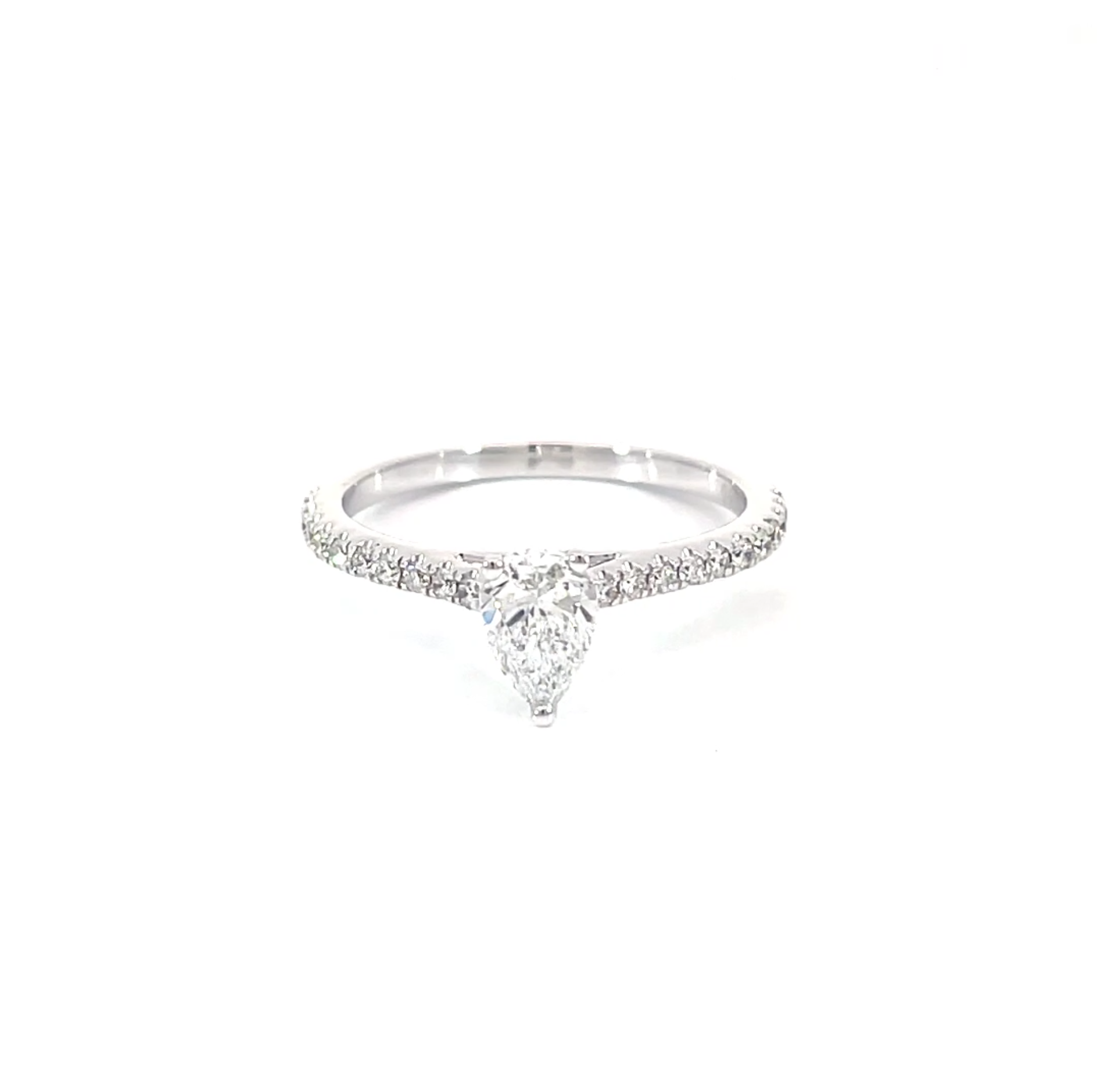 Pear Pave Ring showing 0.50 carat pear cut center diamond with pave setting in 18K white gold