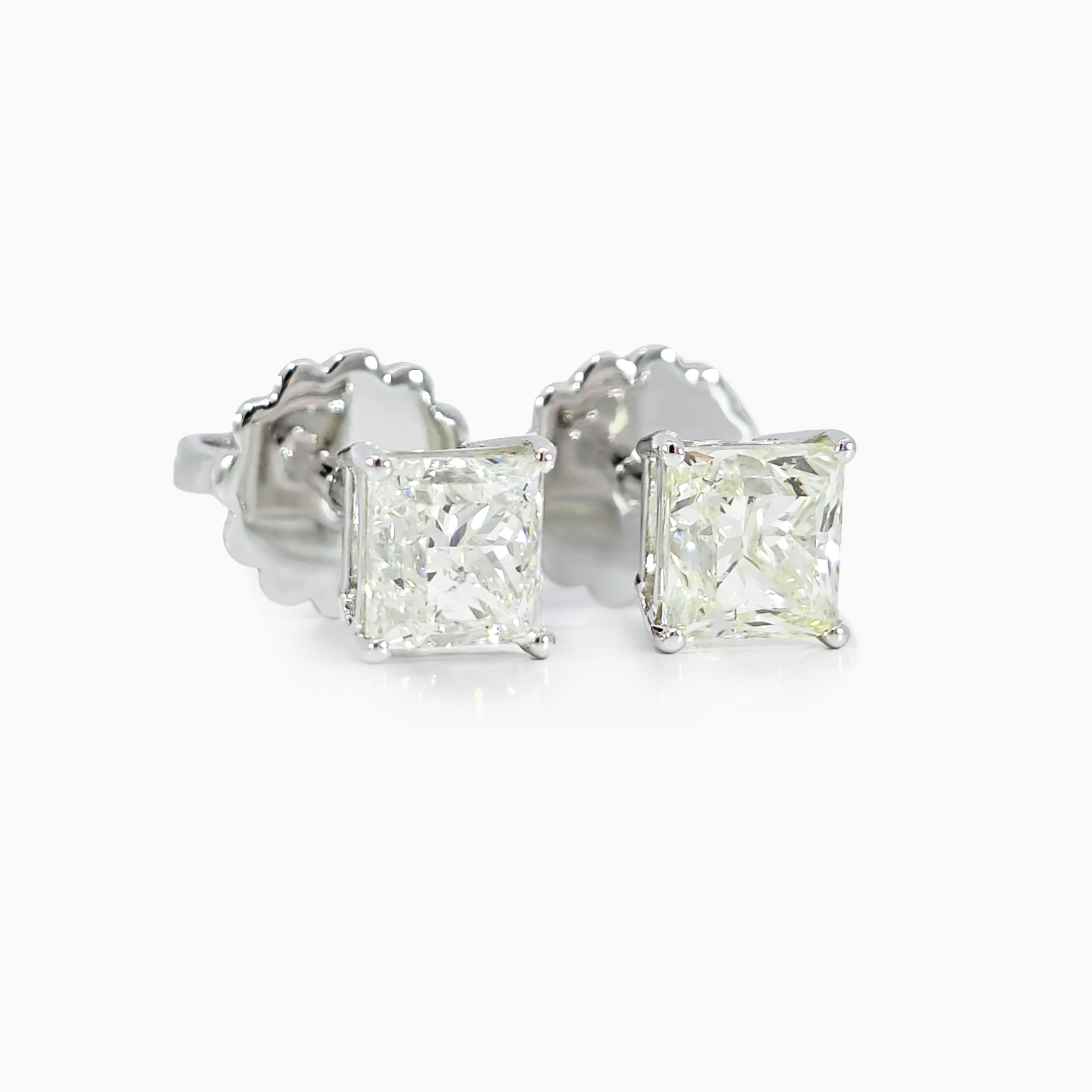 Solitaire Princess Earring side view showing 2.00 carat princess cut diamonds in 18K white gold setting
