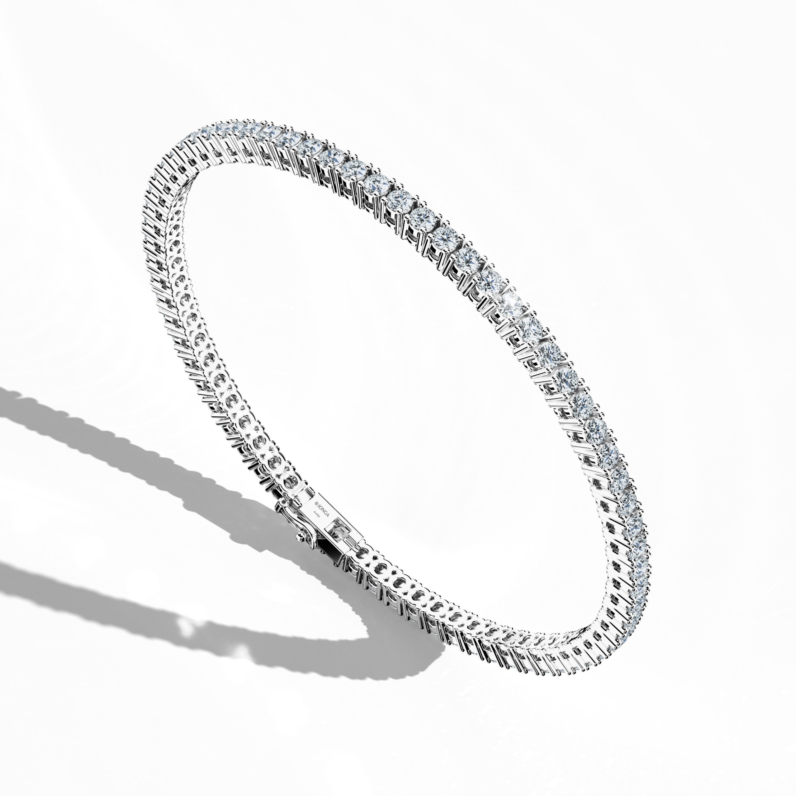 This 5-carat diamond tennis bracelet, also known as a line bracelet, eternity bracelet, river bracelet, or inline bracelet, is presented in platinum (Pt950). Seen from the side, its round brilliant stones showcase a continuous diamond line. The secure prong setting ensures lasting beauty, making it perfect for elegant events or daily wear. Keywords: diamond tennis bracelet, platinum, line bracelet.
