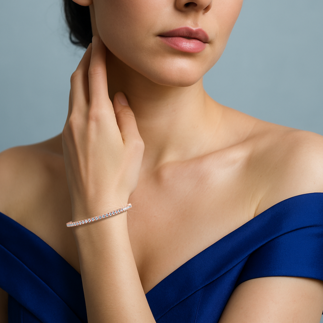 This 7-carat diamond tennis bracelet in rose gold (sometimes referred to as pink gold or red gold) is displayed on a woman's wrist, demonstrating its soft hue and brilliant sparkle. Also known as a line bracelet, eternity bracelet, river bracelet, or inline bracelet, it features prong-set round diamonds in a graceful row. Ideal for special moments or everyday style, it flatters a variety of outfits. Keywords: diamond tennis bracelet, rose gold, line bracelet.