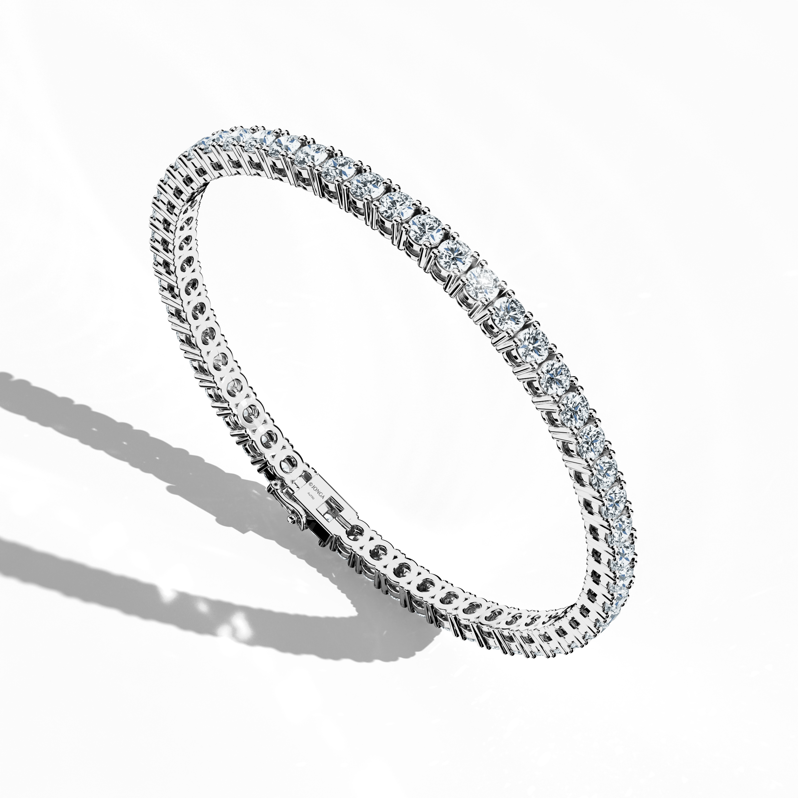 Shown from a standing front top side view, this 8-carat diamond tennis bracelet in белое золото (also called grey gold or palladium gold) features a radiant line of prong-set round diamonds. Also known as a line bracelet, eternity bracelet, river bracelet, or inline bracelet, its design harmonizes modern sophistication with classic allure. The piece’s balanced silhouette and secure clasp make it ideal for both special occasions and daily elegance. Keywords: diamond tennis bracelet, белое золото, luxury.