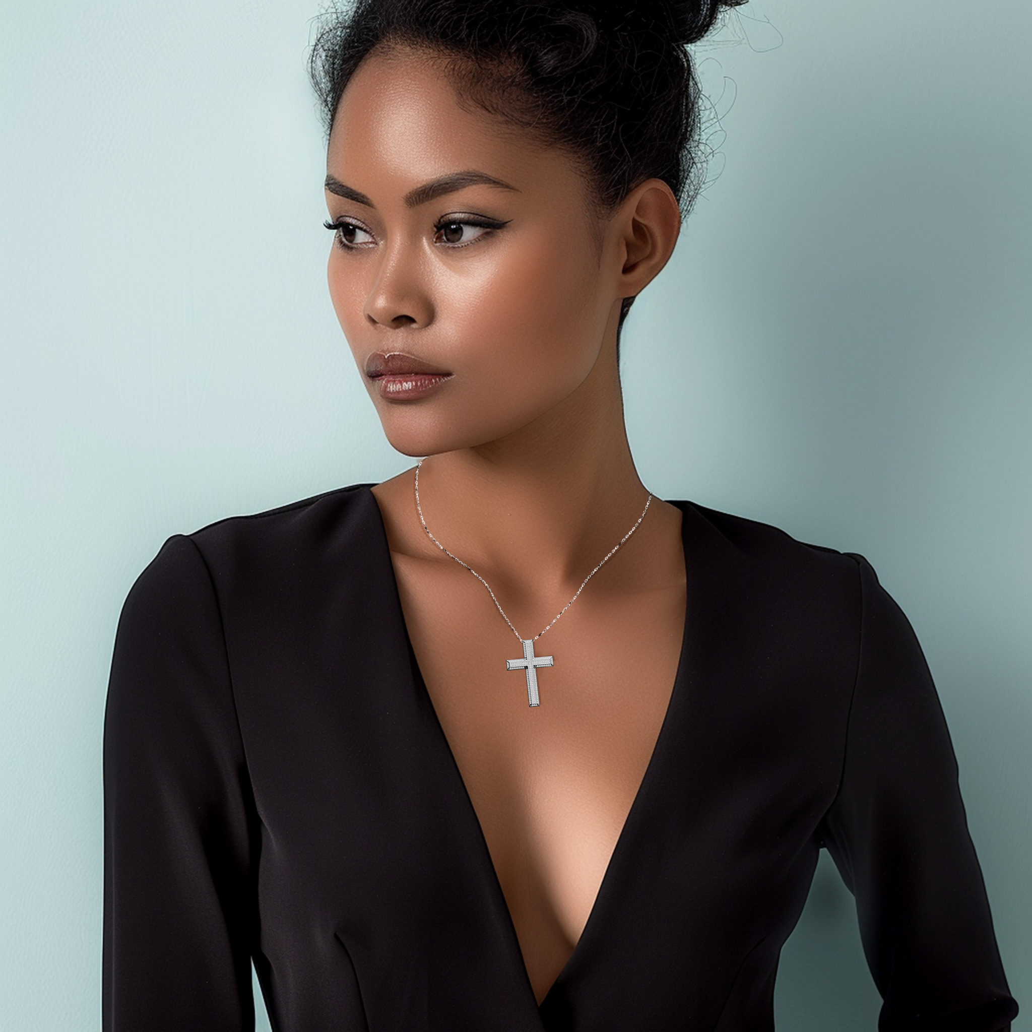 A woman wearing a 3‑step paved cross pendant in gleaming белое золото, sometimes referred to as pale or silver‑hued gold. The multi‑step or stacked cross design, adorned with 1.20 carat of pavé diamonds, rests gracefully on her neckline, blending timeless devotion with contemporary chic. Its polished finish and refined detailing complement both casual and formal attire. Keywords: 3‑step cross, белое золото, 1.20 carat diamonds, stylish accessory.


