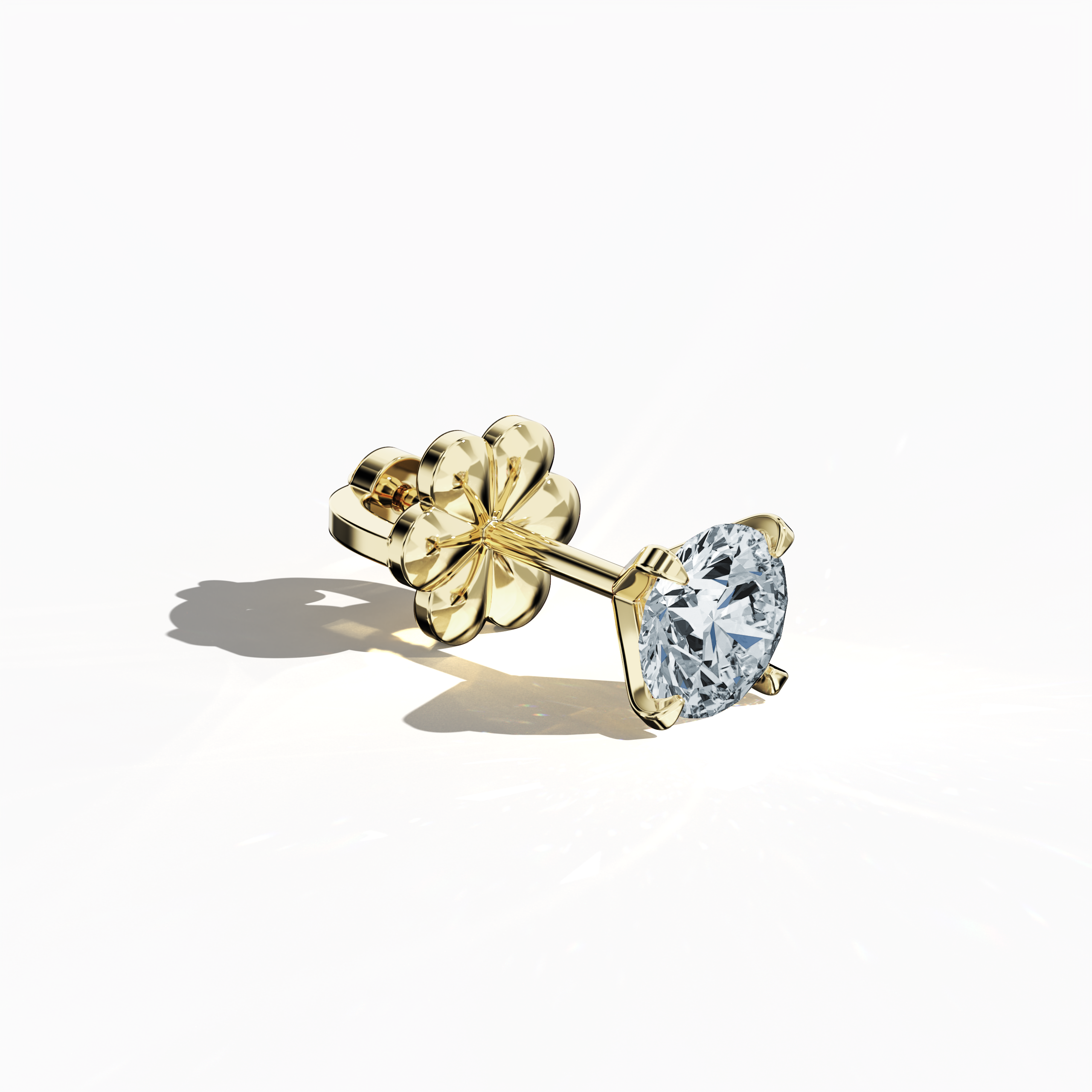 Front top side view of 1.40 carat natural diamond earring in 18k жёлтое золото with nail prong setting; diamond stud, 1.40ct solitaire diamond, luxury fine Украшения/fine Ювелирные изделия ear accessory.