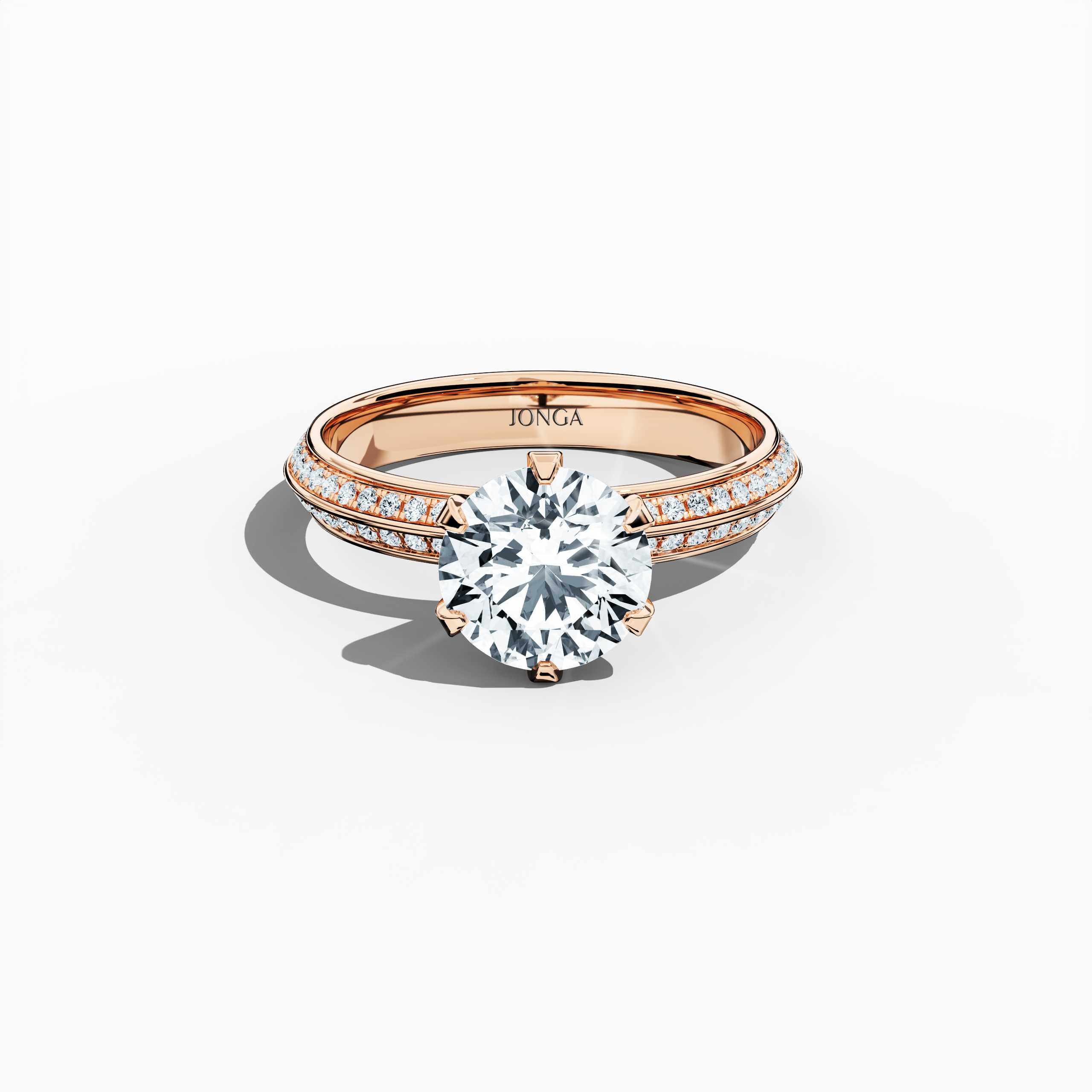 Elegant 2.40 ct diamond ring in a six‑prong setting with a pavé band—comprising a 2 ct center stone and 0.40 ct side stones—rendered in soft rose gold (blush/pink gold) with a dual‑tier, step‑accented band and a defined central line. Captured from a front top view, this fine jewelry/fine jewellery ring highlights its luminous pavé detailing and gentle, romantic finish.