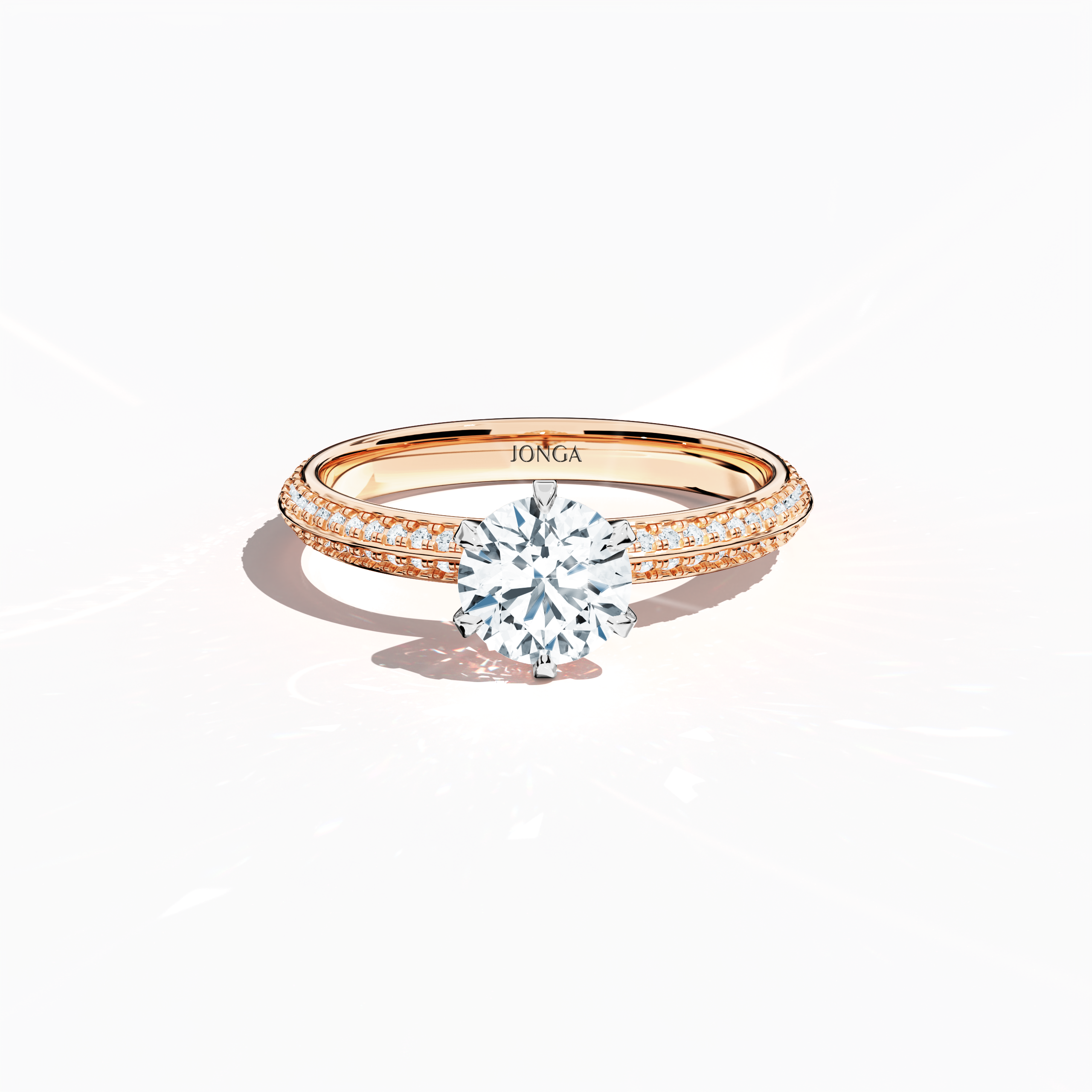Elegant 1.40  карат diamond ring in a pavé setting, with a 1  карат center stone and 0.40  карат side stones, crafted in soft розовое золото (blush/pink gold) with a dual‑tier band defined by a crisp central line. Captured from a front top view, this fine Украшения/fine Ювелирные изделия ring highlights its luminous pavé detail and gentle, sophisticated finish.