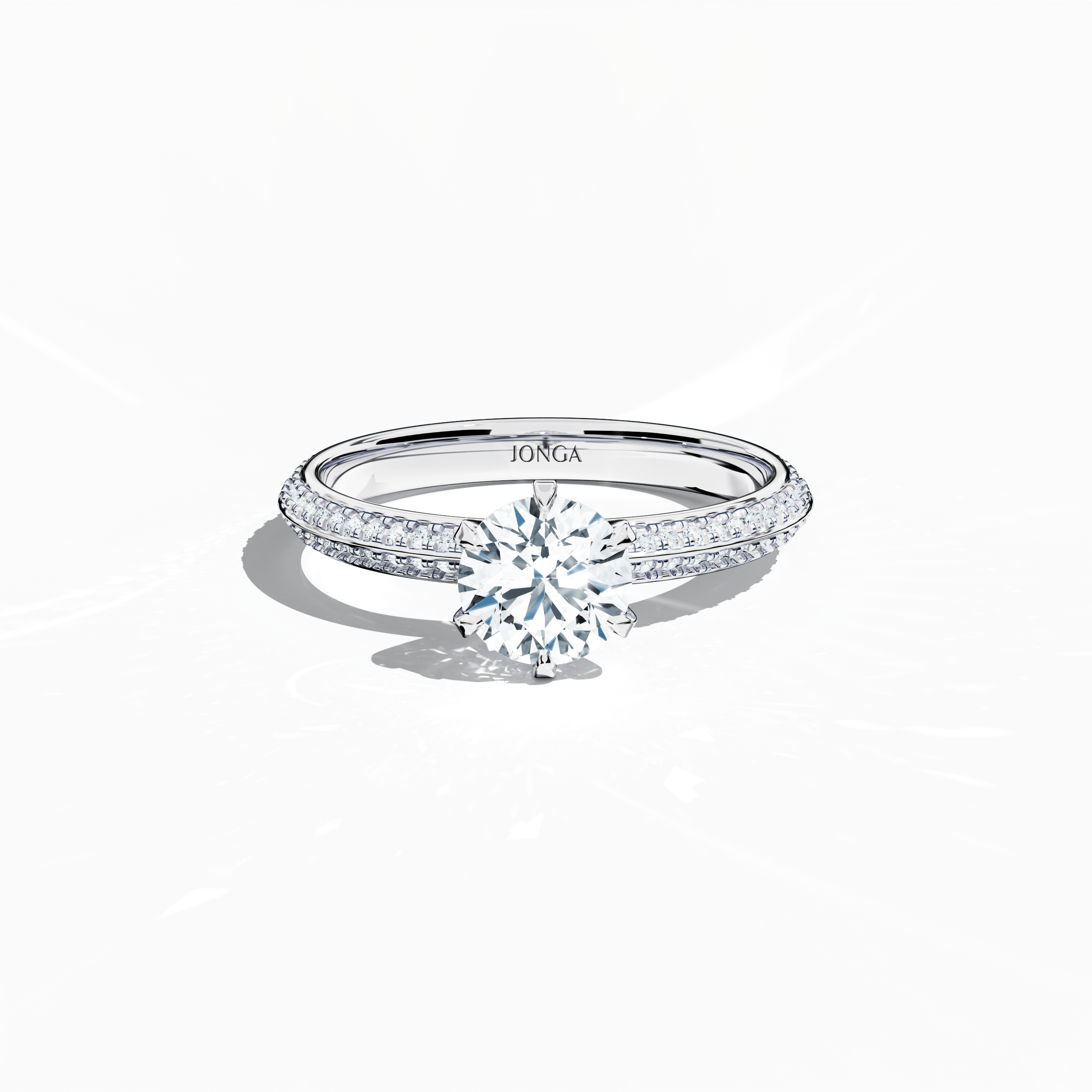 "Elegant 1.40  карат diamond ring in a pavé setting, with a 1  карат center diamond and 0.40  карат side stones, crafted in silvery белое золото with a dual‑tier band defined by a crisp central line. Captured from a front top view, this fine Украшения/fine Ювелирные изделия ring highlights its contemporary design and brilliant sparkle.