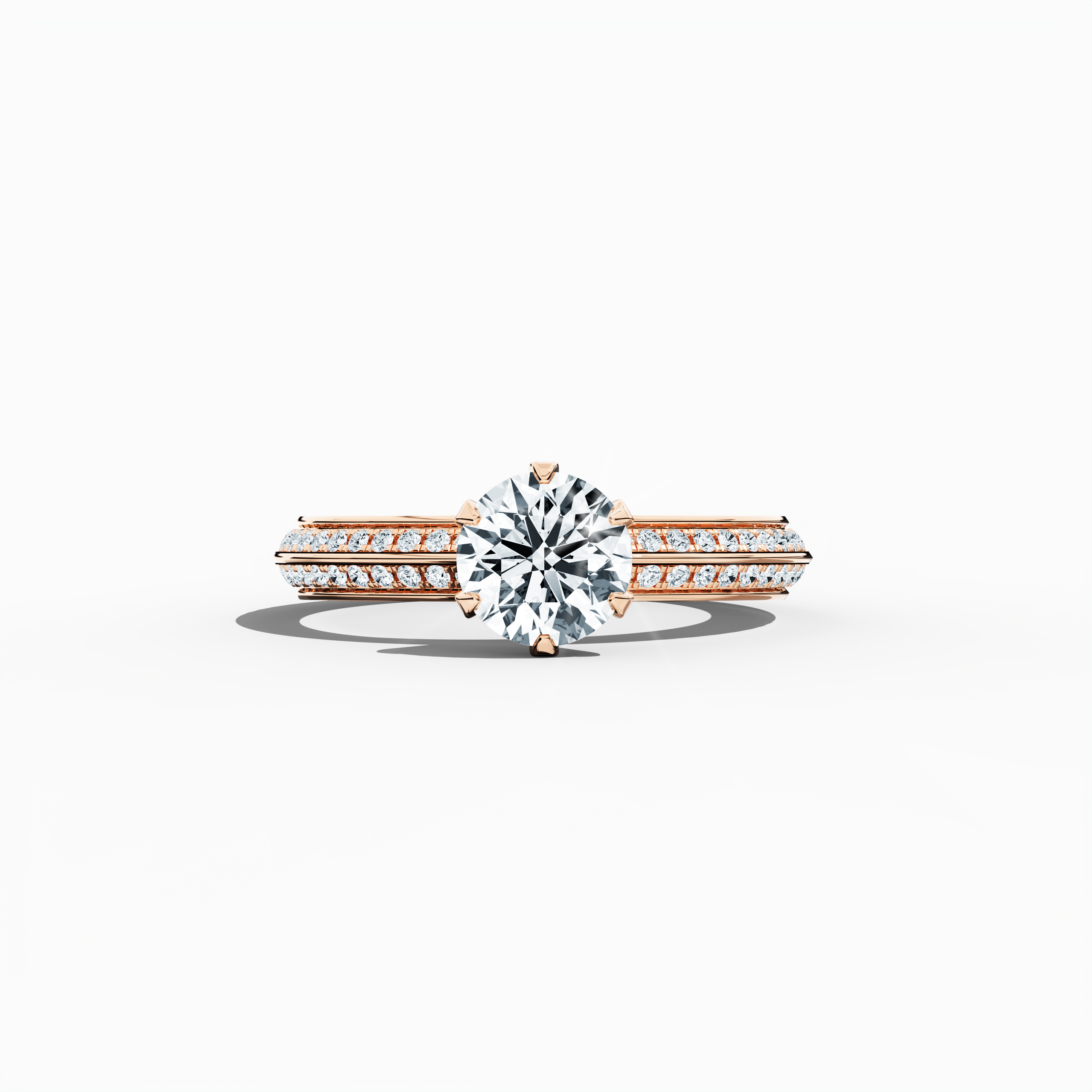 Solitaire paved ring with 1.40 ct total diamonds – featuring a 1 ct center diamond and 0.40 ct pavé side stones – set in a soft rose gold band (blush/pink gold) with a modern two‑step design and a sharp central line. Shown in a sleeping front view on a flat surface, this fine jewelry/fine jewellery ring exudes romantic warmth and contemporary elegance.