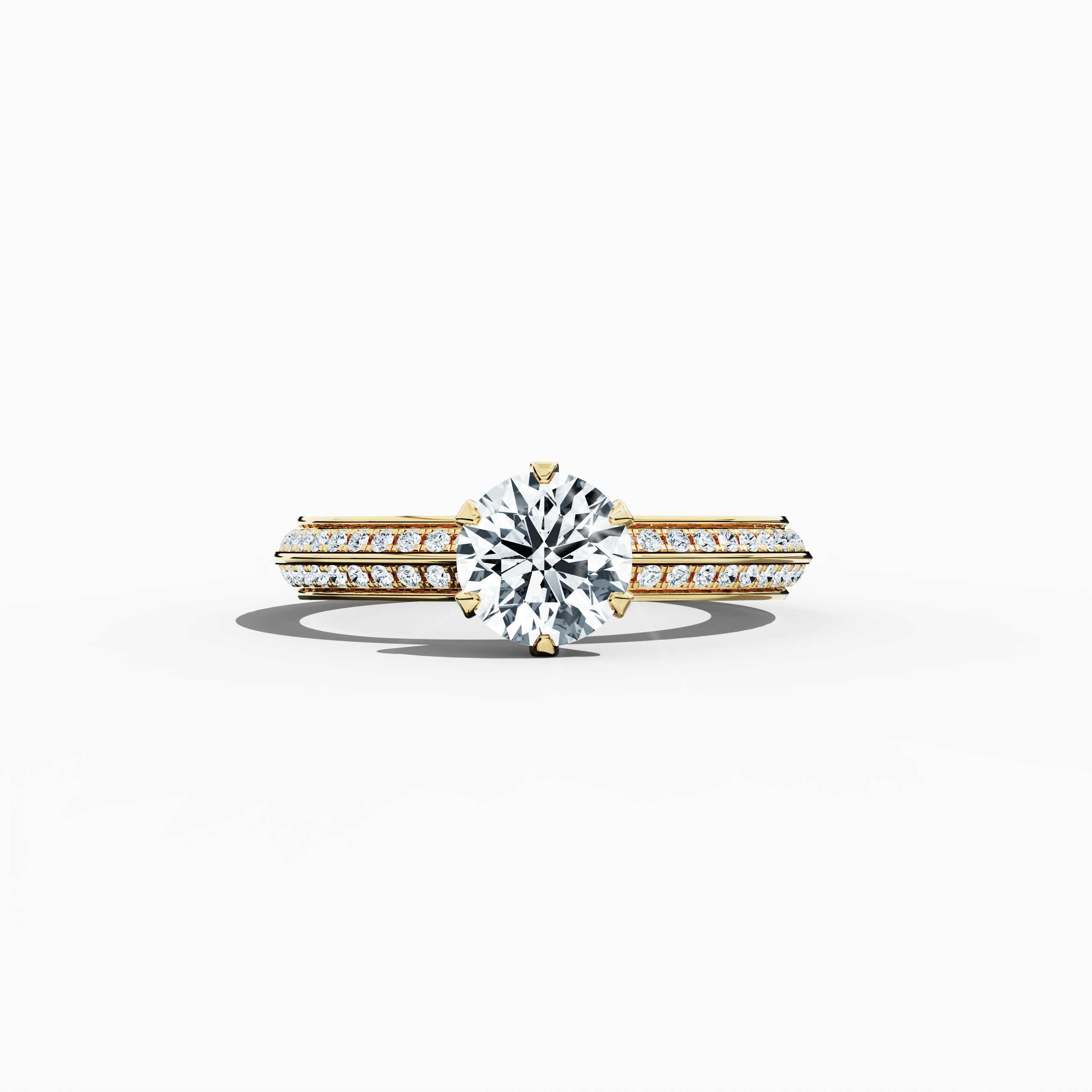 Solitaire paved ring with 1.40 ct total diamonds – featuring a 1 ct center diamond and 0.40 ct pavé side stones – set in a rich yellow gold band with a modern two‑step design and a sharp central line. Shown in a sleeping front view on a flat surface, this fine jewelry/fine jewellery ring radiates warm, classic brilliance.