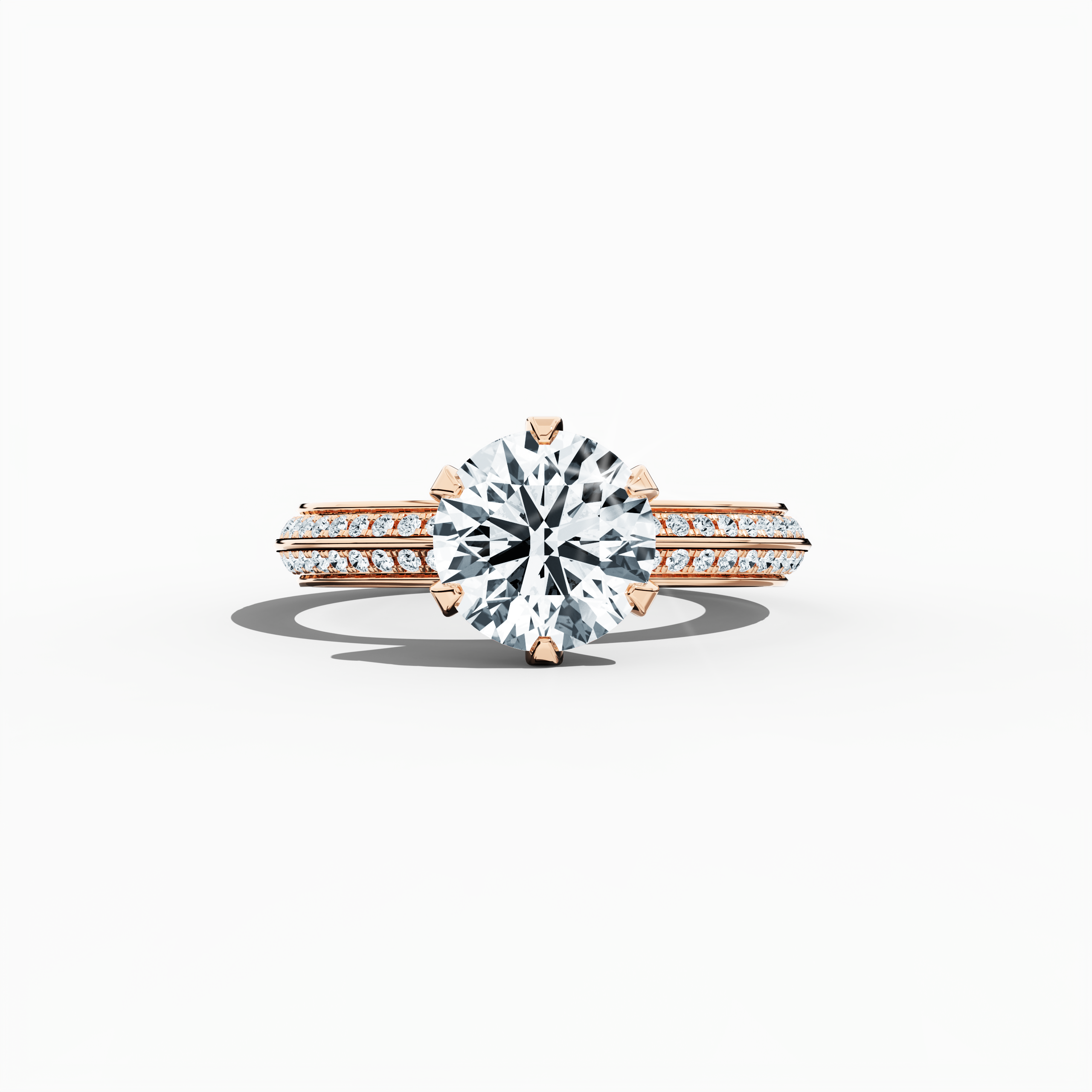 Solitaire paved ring with 2.40 ct total diamonds—featuring a 2 ct center diamond and 0.40 ct pavé side stones—set in a soft rose gold band with a modern two‑step design and a sharp central line. Shown in a sleeping front view on a flat surface, this fine jewelry/fine jewellery ring radiates a warm, romantic glow and refined elegance.