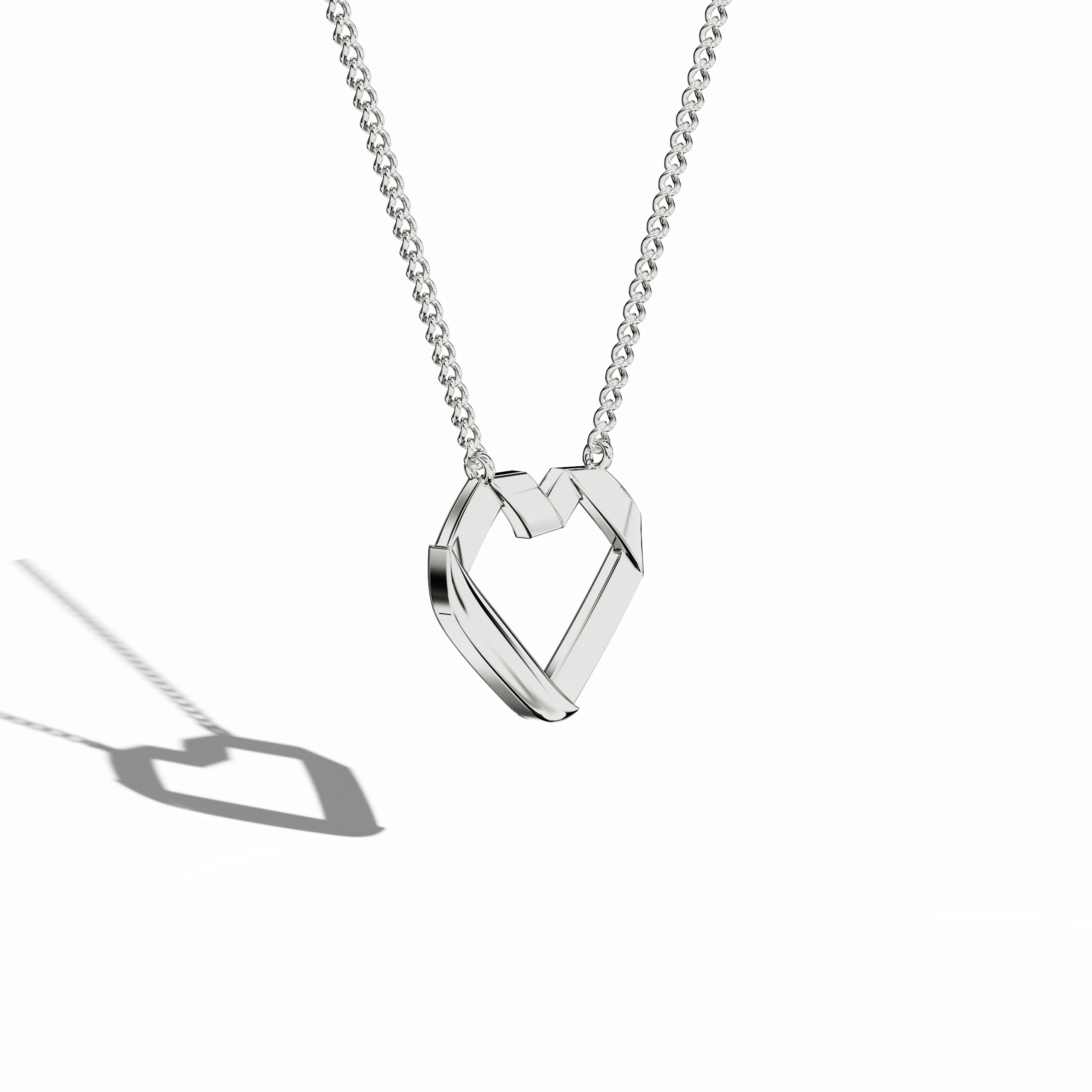 Angled top perspective revealing a refined open-heart Украшения (also known as Ювелирные изделия, joias, bijoux, gioielli, schmuck) style in белое золото (oro blanco, or blanc, Weißgold). This piece, identified as a heart-pendant, heart necklace, love pendant, collier cœur, colgante de corazón, pendentif cœur, collana cuore, or Halskette Herz, emphasizes its sculptural contours and sleek edges. The polished surface reflects light, enhancing its modern charm. Keywords: heart-pendant, белое золото, Украшения.