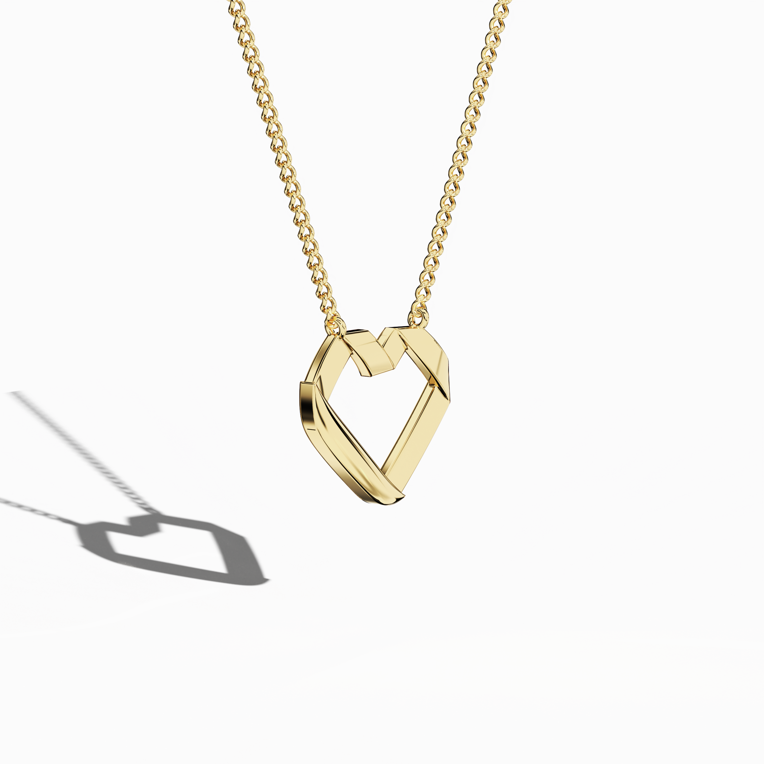 Angled top perspective revealing a radiant open-heart Украшения (Ювелирные изделия, joias, bijoux, gioielli, schmuck) style in жёлтое золото (oro amarillo, or jaune, Gelbgold). Labeled as a heart-pendant, heart necklace, love pendant, collier cœur, colgante de corazón, pendentif cœur, collana cuore, or Halskette Herz, it combines warm tones with a modern geometric outline. The glossy surface reflects light, enhancing its graceful appeal. Keywords: heart-pendant, жёлтое золото, Украшения.