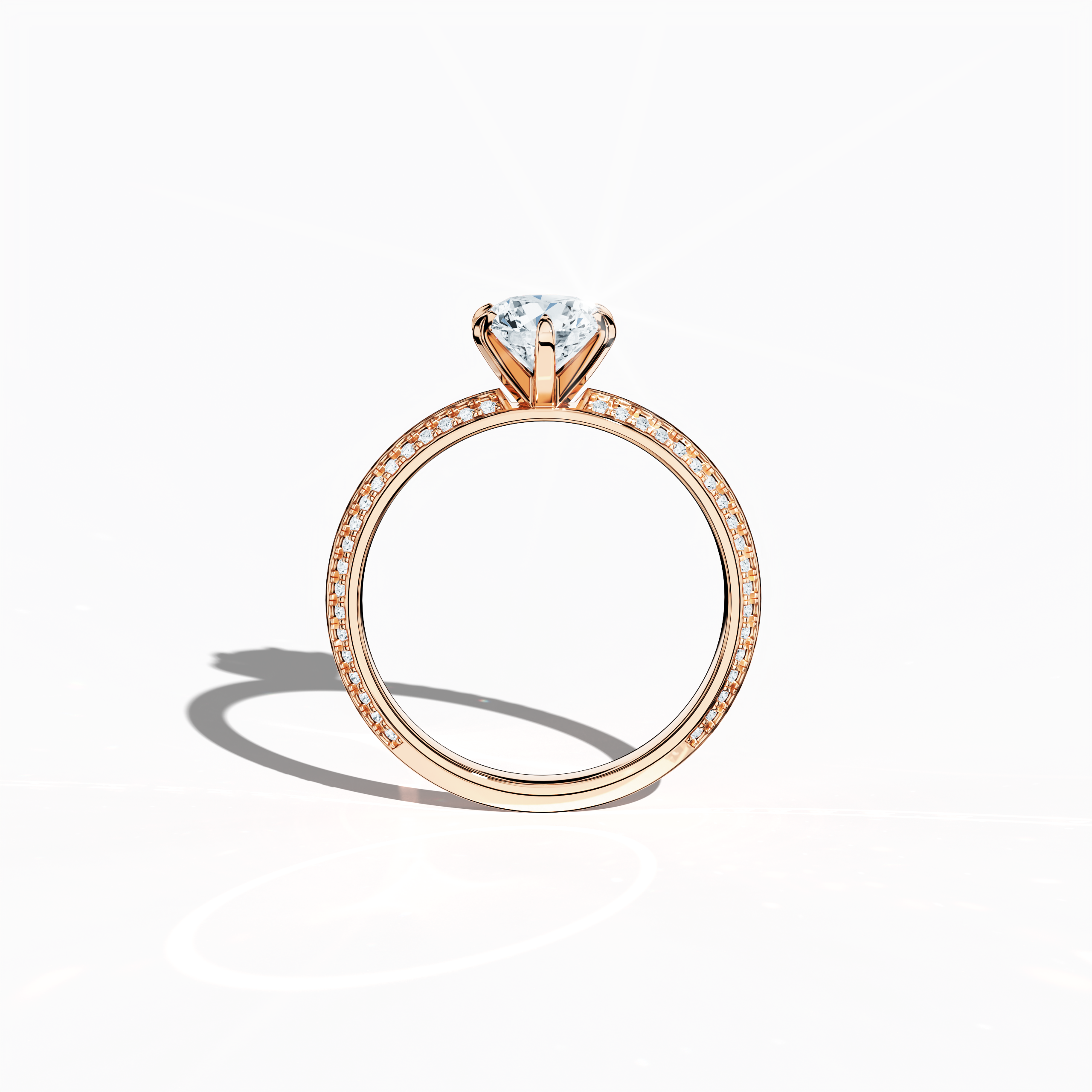 Classic solitaire diamond ring with 1.40 ct total carats – 1 ct center diamond and 0.40 ct pavé side stones – set in soft rose gold (blush/pink gold) with a distinctive two‑step band and a crisp central line. Displayed in a front view, this fine jewelry/fine jewellery piece blends timeless romance with modern design.