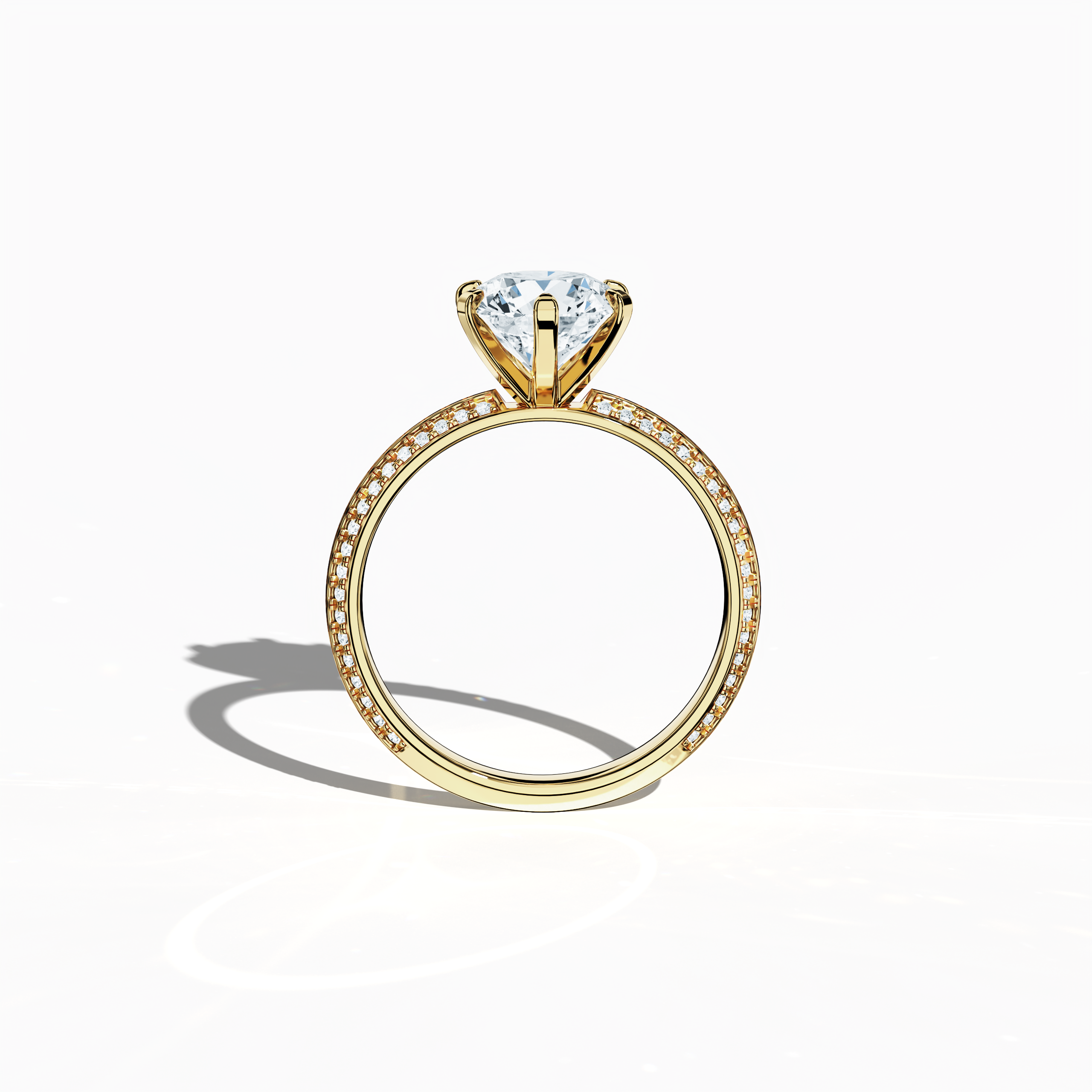 Classic solitaire diamond ring with 2.40 ct total carats—2 ct center and 0.40 ct pavé side stones—set in a rich yellow gold band featuring a distinctive two‑step band design with a crisp central line. Displayed in a front view, this fine jewelry/fine jewellery ring exudes timeless luxury and warm sophistication.