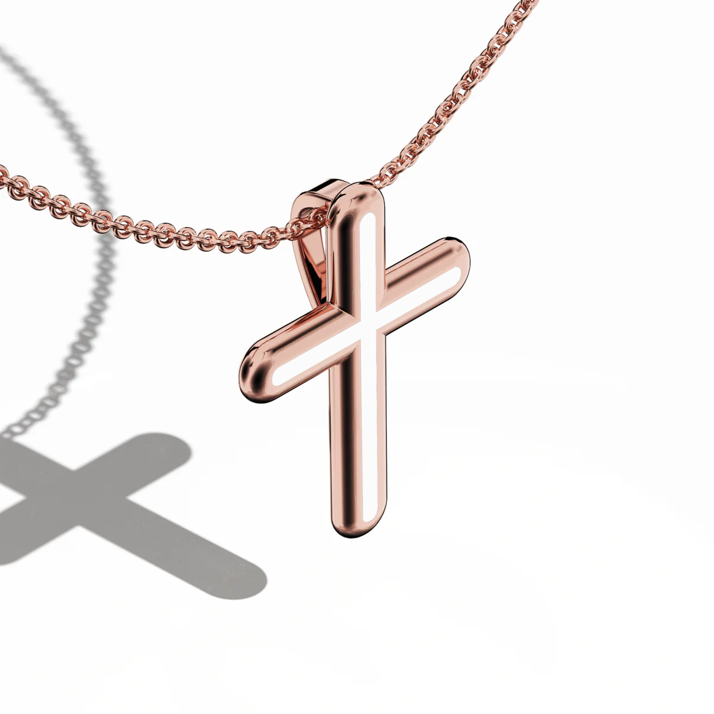 Front top side view of a center enamel cross pendant in radiant розовое золото, occasionally called pink or blush gold. The bright white enamel (sometimes labeled pearl or ivory) outlines the multi-step or tri-tier cross shape from this angled perspective. Polished edges highlight a refined blend of warm metal and fresh enamel, marrying tradition with contemporary charm. Keywords: enamel cross, розовое золото, white enamel, tri-tier design.