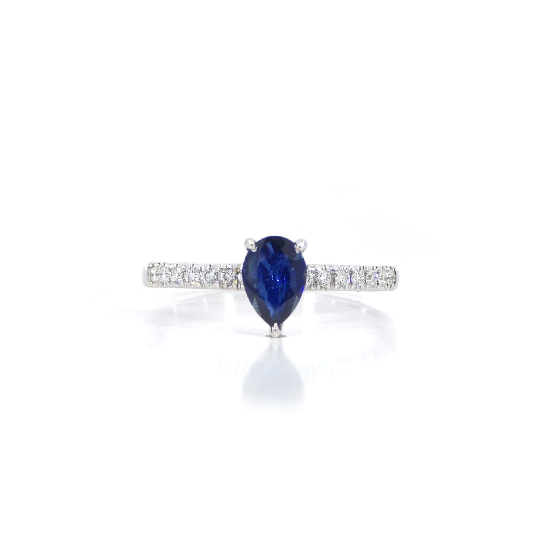Pear Blue Sapphire Paved Ring 0.61 carat blue sapphire 0.13 carat diamonds D-F color VVS-VS clarity 18K white gold Dubai
