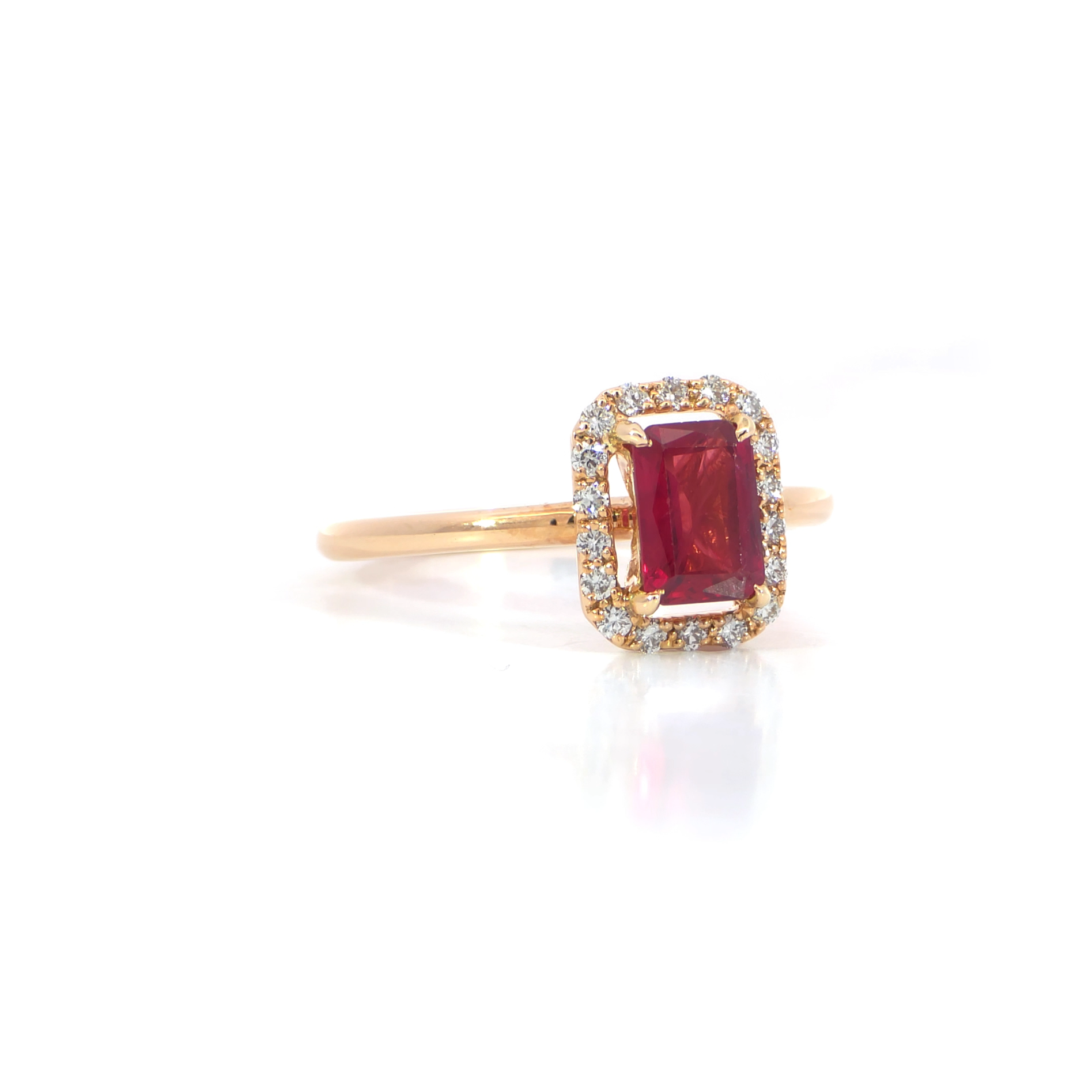 Radiant red ruby ring side view showing 0.93 carat radiant cut red ruby with diamond accents 18K white gold

